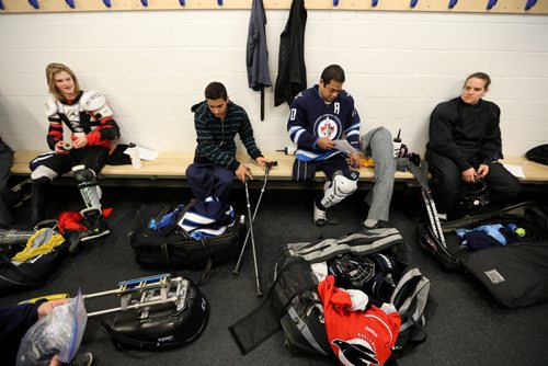 TREVOR HAGAN / WINNIPEG FREE PRESS
From left, Jordan Banman, Omar Al Ziab, James Bernus and Corrine Wengi prior to a Team Manitoba sledge hockey practice. Omar Al Ziab, 15, a Syrian refugee and amputee who only took to the ice for the first time last August, Monday, May 1, 2017.