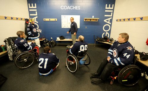 TREVOR HAGAN / WINNIPEG FREE PRESS
Coach Bill Muloin giving instructions prior to a Team Manitoba sledge hockey practice featuring Omar Al Ziab, 15, a Syrian refugee and amputee who only took to the ice for the first time last August, Monday, May 1, 2017.