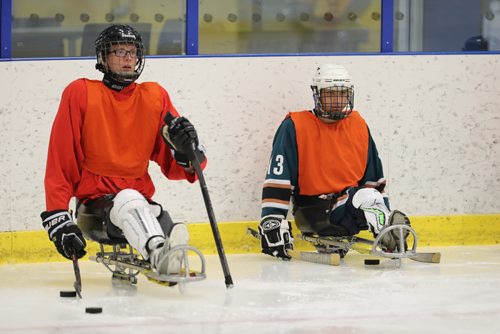 TREVOR HAGAN / WINNIPEG FREE PRESS
Team Manitoba sledge hockey practice featuring Omar Al Ziab, 15, right, a Syrian refugee and amputee who only took to the ice for the first time last August, Monday, May 1, 2017.