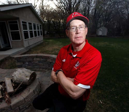 PHIL HOSSACK / WINNIPEG FREE PRESS  - U of W baseball coach Morgan de Pena poses in his back yard Tuesday after his team and program were cut due to a lack of provincial funding Tuesday. (dePena was hosting a season end BBQ for the team, but players were slow to arrive and hesitant to be photographed after the news broke this afternoon.) See Mike Sawatzky's story. -  May2, 2017