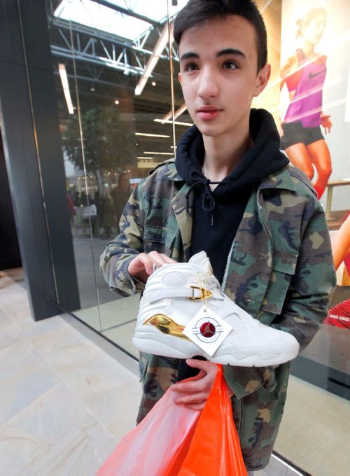 BORIS MINKEVICH / WINNIPEG FREE PRESS
Outlet Collection opens it's doors to the public today. The outlet mall is located on the corner of Kenaston and Sterling Lyon Parkway. Here Ryan Sehovic-Mrsa with some great sneaker deals from Nike store. MURRAY MCNEILL STORY. May 3, 2017