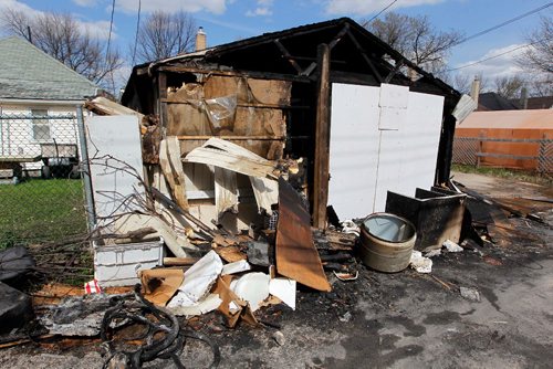 BORIS MINKEVICH / WINNIPEG FREE PRESS
Fires in the north end. Garage in the back of 722 College was burned. Major damage. May 4, 2017