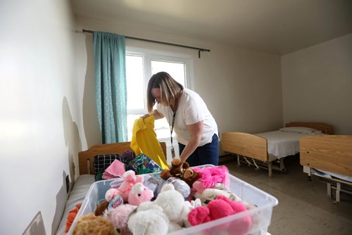 RUTH BONNEVILLE /  WINNIPEG FREE PRESS

Gretna MB
Carolyn Ryan with Manitoba Houseing, goes through some donations of hygiene items and teddy bears that were made by locals in the community in one of the rooms that will be used to house new refugee claimants Thursday.  
The province opens a temporary shelter for refugee claimants near the border in Gretna to ease the flow of asylum seekers arriving in Winnipeg at all hours needing housing and help.
Gretna's former seniors home that has been sitting vacant is being repurposed to house asylum seekers for a few days before they can move on to more long-term shelter in Winnipeg. 
See Jane Gerster story.  



May 04, 2017