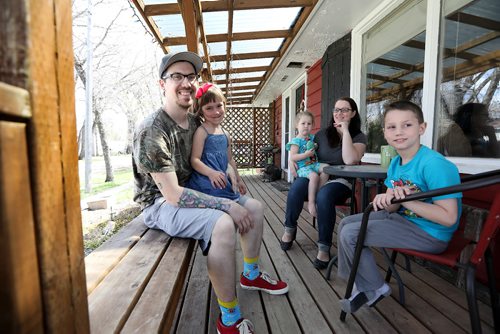 RUTH BONNEVILLE /  WINNIPEG FREE PRESS

Gretna MB
Family living in Gretna near the seniors home are happy the community is doing what it can to help the new asylum seekers,  Photo taken in their home and on front deck.  Names of family members: Madison Sawatzky (dad), Ayden (7yrs, boy), Ruby (5yrs), Lylah (almost 3yrs) and mom Amanda Sawatzky.  
The province opens a temporary shelter for refugee claimants near the border in Gretna to ease the flow of asylum seekers arriving in Winnipeg at all hours needing housing and help.
Gretna's former seniors home that has been sitting vacant is being repurposed to house asylum seekers for a few days before they can move on to more long-term shelter in Winnipeg. 
See Jane Gerster story.  



May 04, 2017