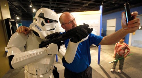 PHIL HOSSACK / WINNIPEG FREE PRESS  -  Jared Peters (right) gets a quick selfie Wednesday evening at the Manitoba Museum's "May the 4th" Star Wars Day event. Museum visitors were encouraged to come in costume to win a Star Wars Lego set and a Squad of Storm Troopers from the 501st Legion paid a guest visit. See release.  -  May 4, 2017