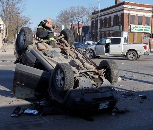 BORIS MINKEVICH / WINNIPEG FREE PRESS
MVC ROLLOVER - Main Street and Selkirk Avenue this morning. Crash scene gets cleaned up. Northbound traffic was blocked for hours. May 5, 2017