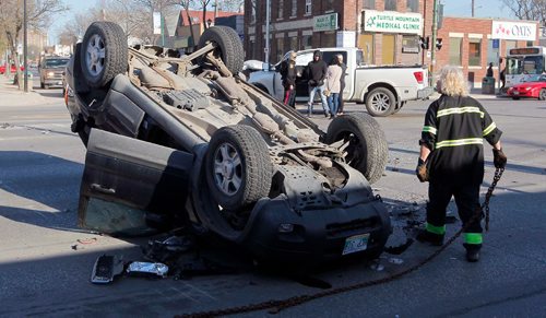BORIS MINKEVICH / WINNIPEG FREE PRESS
MVC ROLLOVER - Main Street and Selkirk Avenue this morning. Crash scene gets cleaned up. Northbound traffic was blocked for hours. May 5, 2017