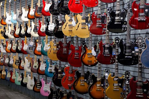 BORIS MINKEVICH / WINNIPEG FREE PRESS
Long & McQuades new flagship Winnipeg store. There is a wall of guitars in the store. For Mondays real estate column. Murray McNeill story. May 5, 2017