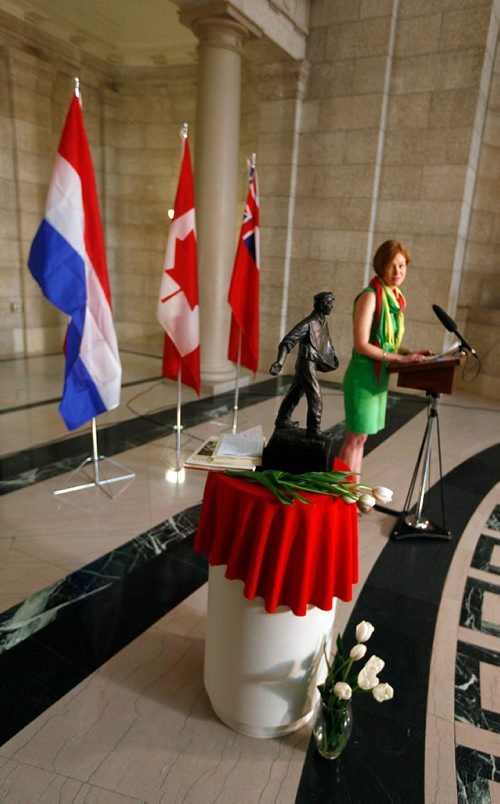 PHIL HOSSACK / WINNIPEG FREE PRESS  -    Virginie de Vischer, honorary consul, Kingdom of the Netherlands in Manitoba looks towards "The Sower", a maquette by Leo Mol as she presented the gift of the miniature version of the Statue in Leo Mol Park to the Provincail Legislature.  The gift was presented to the Province at the Legislature Building's Rotunda Friday afternoon. See release.  -  May 5, 2017