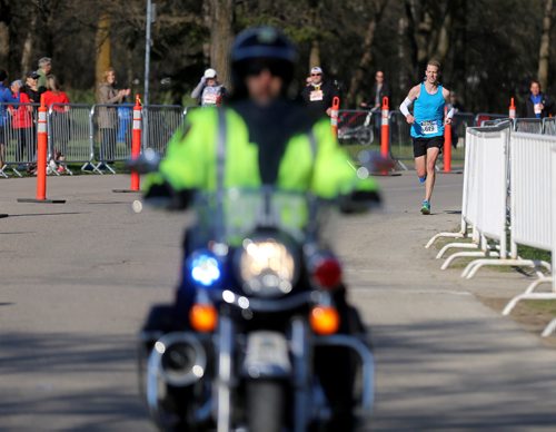 TREVOR HAGAN / WINNIPEG FREE PRESS
Brian Walker approaches the finish line to win the half. The 13th annual Winnipeg Police Service Half Marathon started and finished in Assiniboine Park, Sunday, May 7, 2017.