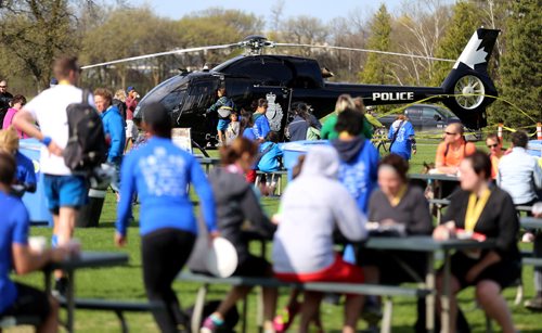 TREVOR HAGAN / WINNIPEG FREE PRESS
Air 1, the police helicopter sits on the ground in the park. The 13th annual Winnipeg Police Service Half Marathon started and finished in Assiniboine Park, Sunday, May 7, 2017.