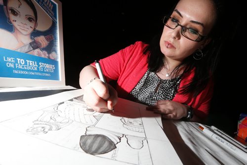 JOHN WOODS / WINNIPEG FREE PRESS
Jamie Isfeld, whose comic brand is To Tel Stories, works on a piece at Prairie Comics Festival at the Millennium Library Sunday May 7, 2017. Isfeld describes her work leaning toward an Indi feel versus a mainsteam vibe. Isfeld says her latest work Street Style Samurai is a cautionary tale about technological privacy in the digital age and it also has fantastic shoes and fabulous fashion.