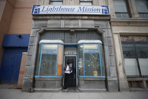 JOHN WOODS / WINNIPEG FREE PRESS
A Lighthouse Mission client is turned away by a locked door and a closed due to flooding sign Monday, May 8, 2017. The Main Street shelter serves about 250 people a day and will be closed for a month due to a broken water main.