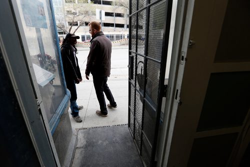 JOHN WOODS / WINNIPEG FREE PRESS
Lighthouse Mission's operation manager Joel Cormie informs a client that they will be closed due to flooding Monday, May 8, 2017. The Main Street shelter serves about 250 people a day and will be closed for a month due to a broken water main.