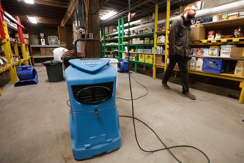 JOHN WOODS / WINNIPEG FREE PRESS
With industrial dryers on the floor Lighthouse Mission's operation manager Noel Cormie stands in a formally flooded basement Monday, May 8, 2017. The Main Street shelter serves about 250 people a day and will be closed for a month due to a broken water main.