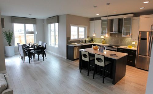 BORIS MINKEVICH / WINNIPEG FREE PRESS
NEW HOMES - 19 Del Monica Road. Open concept main floor. Kitchen, right, and dining area, right. TODD LEWYS STORY. May 8, 2017