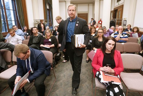 JOHN WOODS / WINNIPEG FREE PRESS
Kevin Rebeck, President of Manitoba Federation of Labour, enters a public hearing on Bill 29 at the Manitoba Legislature Monday, May 8, 2017.