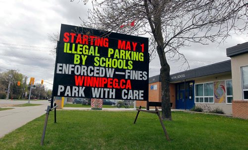 BORIS MINKEVICH / WINNIPEG FREE PRESS
Royal School, 450 Laxdal Road, has a sign alerting parents about new parking/stopping enforcement in the area. This to help stop illegal parking and stopping at schools. May 9, 2017