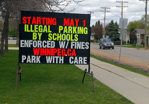 BORIS MINKEVICH / WINNIPEG FREE PRESS
Royal School, 450 Laxdal Road, has a sign alerting parents about new parking/stopping enforcement in the area. This to help stop illegal parking and stopping at schools. May 9, 2017