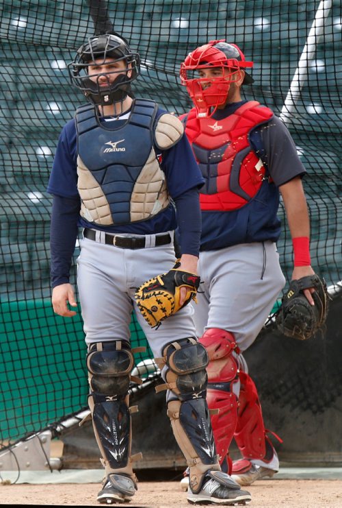 WAYNE GLOWACKI / WINNIPEG FREE PRESS
Catchers Conor Sullivan, left, and Alixon Suarez at the Winnipeg Goldeyes practice at Shaw Park Tuesday. Mike McIntyre story May 9 2017