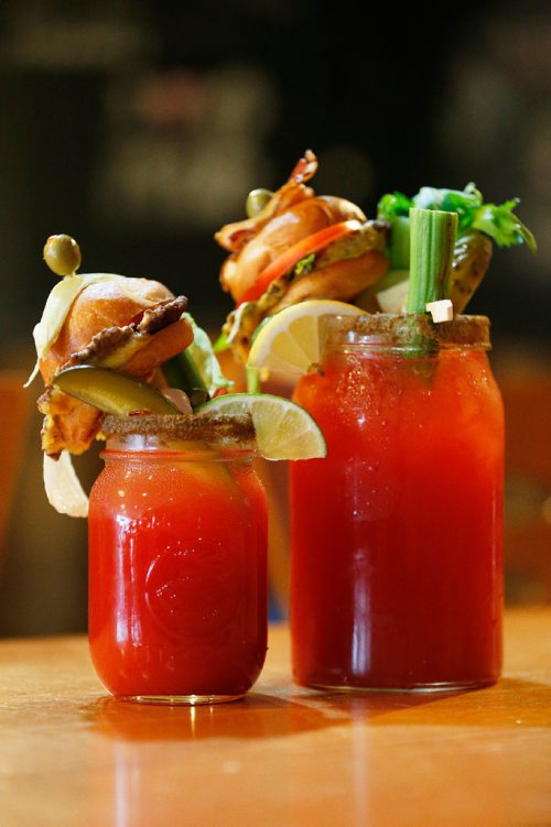 JOHN WOODS / WINNIPEG FREE PRESS
The Whole 9 Caesar (R) and Caesar With Slider are photographed at Market Burger Tuesday, May 9, 2017. Market Burger serves their caesar with a fully loaded nine ingredient cheeseburger slider as garnish. National Caesar Day falls on May 18.
