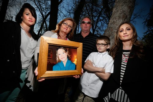 JOHN WOODS / WINNIPEG FREE PRESS
Amber McFarland's family, from left, Ashley (sister), Lori (mother), Scott (father), Christian (nephew) and Lisa (sister) McFarland are photographed in Portage La Prairie Tuesday, May 9, 2017.  Amber was last seen in Portage La Prairie on security camera footage during the early morning of October 18, 2008.
