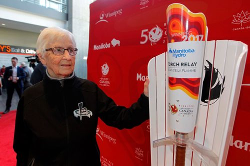 BORIS MINKEVICH / WINNIPEG FREE PRESS
CANADA GAMES TORCH RELAY EVENT - The 2017 Canada Games Host Society had an event at MB Hydro headquarters to honour and celebrate individuals who will carry the Roly McLenahan Torch, as part of the Manitoba Hydro Torch Relay. Alda Tait,89, with torch. CAROL SANDERS STORY. May 12, 2017