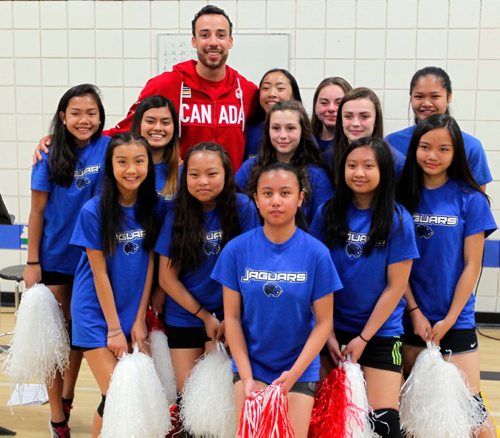 BORIS MINKEVICH / WINNIPEG FREE PRESS
O.V. Jewitt School in the Seven Oaks School Division celebrated the success of former student named Justin Duff who recently played volleyball for Team Canada at the Olympics in Rio. Here Justin Duff poses for a photo with the grade 7-8 girls volleyball team. JASON BELL STORY. May 12, 2017