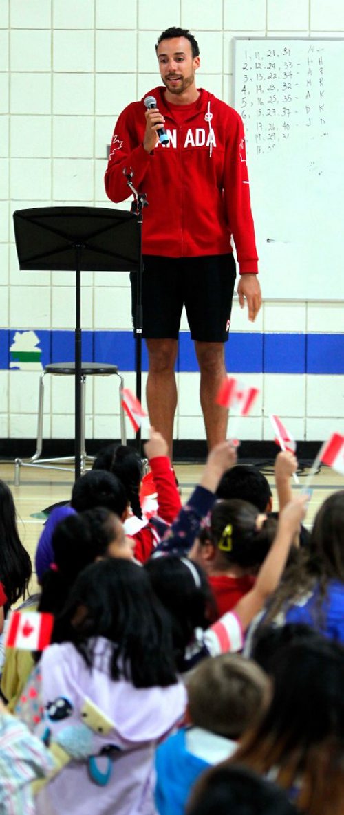 BORIS MINKEVICH / WINNIPEG FREE PRESS
O.V. Jewitt School in the Seven Oaks School Division celebrated the success of former student named Justin Duff who recently played volleyball for Team Canada at the Olympics in Rio. Here Justin Duff talks to the kids at the assembly. JASON BELL STORY. May 12, 2017