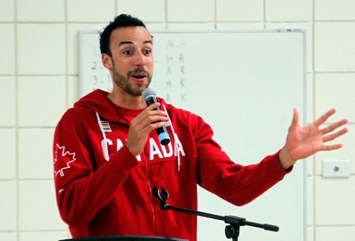 BORIS MINKEVICH / WINNIPEG FREE PRESS
O.V. Jewitt School in the Seven Oaks School Division celebrated the success of former student named Justin Duff who recently played volleyball for Team Canada at the Olympics in Rio. Here Justin Duff says some inspiring words to the kids at the assembly. JASON BELL STORY. May 12, 2017