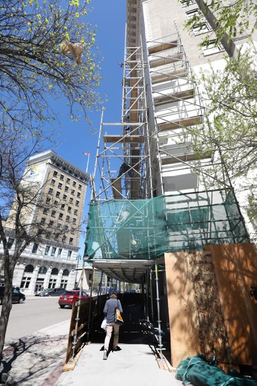 RUTH BONNEVILLE /  WINNIPEG FREE PRESS

BIZ - 457 Main St.


PLACE: Confederation Life Building
Workers put up scaffolding Friday. 


SUBJECT: Shindico Realty Inc. will be spending about $1 million this summer on repairs to the facade of this 115-year-old, 10-storey office tower. Photo of the scaffolding work crews are erecting. They hope to complete the work by September.

For Monday's real estate column. 
May 11, 2017