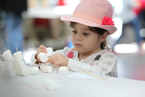 RUTH BONNEVILLE /  WINNIPEG FREE PRESS

SCIENCE RENDEZVOUS -  U of M, 
Aria Bautista (3yrs) learns to build a structure made of marshmallows and toothpicks at one of the many hands on teaching booths set up for kids at the SCIENCE RENDEZVOUS Saturday, an event celebrating everything science similar to what kids see on Popular Mechanics for Kids. 


May 13, 2017