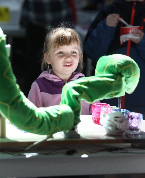 RUTH BONNEVILLE /  WINNIPEG FREE PRESS

SCIENCE RENDEZVOUS -  U of M, 
Nicola Donus (5yrs) checks out the  Pic-a-snake, a robotic stuffed snake that paints pictures from the sound waves in songs set up at the computer programming booth, one of many teaching tables at the SCIENCE RENDEZVOUS at U of M Saturday.

May 13, 2017