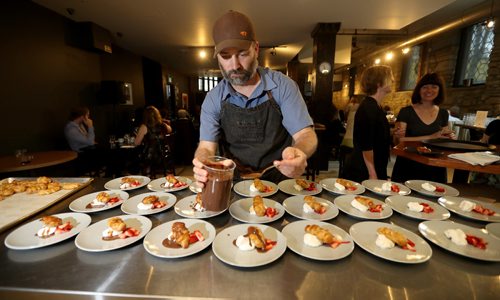 TREVOR HAGAN / WINNIPEG FREE PRESS
Chef Ben Kramer completes the dessert course during the Mothers Day edition of the Sunday Brunch Collective at the Kitchen Sync featuring Sierra Noble, Sunday, May 14, 2017.