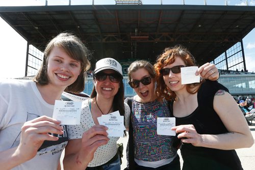 JOHN WOODS / WINNIPEG FREE PRESS
Friends, from left, Shauna Matthews, Genevieve Gay, Kathleen Gould and Amanda Guenter show off their winning race stubs at opening day of racing at Assiniboia Downs Sunday, May 14, 2017.