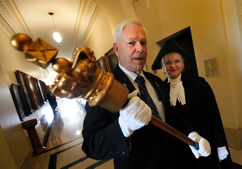 PHIL HOSSACK / WINNIPEG FREE PRESS  -  Speaker Myrna Driedger, and Sergeant-at-Arms Ray Gislason pose with Manitoba's first mace before carrying it into into the Legislative Assembly Monday afternoon. See release "In celebration of Manitoba Day, which was on Friday, May 12, the provinces first mace will be put into service for one day only. It has not been used for 133 years. The acting Sergeant-at-Arms will carry it into the Chamber and it will lay on the table along with the Star Blanket Mace Cushion and the Beaded Mace Runner that were gifted to the Legislative Assembly by Aboriginal peoples in 2010. The Speaker will also have a statement in the House".  -  May 15, 2017