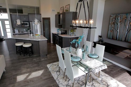 BORIS MINKEVICH / WINNIPEG FREE PRESS
31 Wheelwright Way in Oak Bluff West. Kitchen sports a nice multipurpose island with dining room at the right. Avanti Homes. TODD LEWYS STORY. May 15, 2017