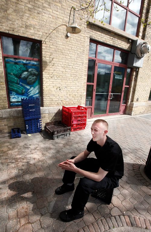 PHIL HOSSACK / WINNIPEG FREE PRESS  -  Taking a break out back of the Forks Market, barternder Jesse Rayner talks about making minimum wage. See Alex Paul's story re: Provincial changes to the minimum wages paid here.  -  May 15, 2017