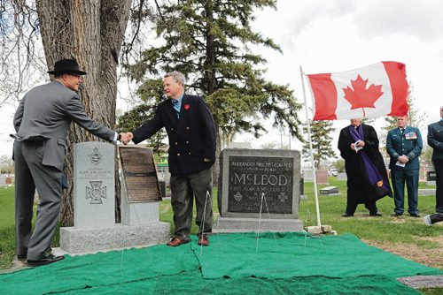 Canstar Community News May 9, 2017 - David Kettle, secretary general of the Commonwealth War Graves Commission, and Alan Adams, Lt. McLeods nephew, at the monument unveiling. (LIGIA BRAIDOTTI/CANSTAR COMMUNITY NEWS/TIMES)