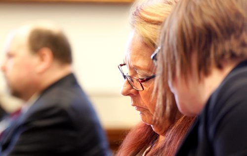 PHIL HOSSACK / WINNIPEG FREE PRESS  -  MGEU representative Michelle Gawronski consults as she prepares to present at a committee hearing on Marijuana at the Legislature Tuesday.  -  May 16, 2017