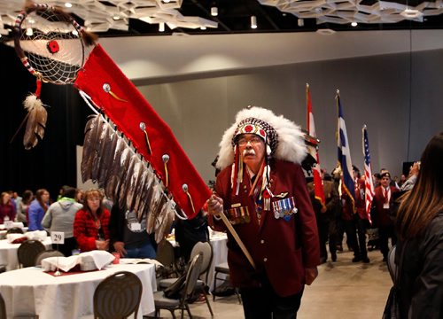 WAYNE GLOWACKI / WINNIPEG FREE PRESS

Elder and War Veteran, Clair Francis led the Grand Entry at the opening ceremonies Wednesday for the Vision Quest Conference & Trade Show  Canadas longest running Aboriginal economic conference. About a thousand people are expected at the event Wednesday and Thursday held at the RBC Winnipeg Convention Centre. The Vision Quests Trade Show consisting of 90 booths provides business networking and exploring partnerships opportunities. release.May 17 2017
