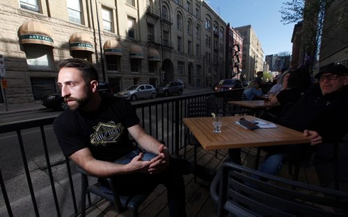 PHIL HOSSACK / WINNIPEG FREE PRESS  -   Owner Mike Del Buono chats while ipatrons relax at King + Bannatyne's new streetside patio. See Jill Wilson's story.   -  May 16, 2017