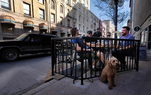 PHIL HOSSACK / WINNIPEG FREE PRESS  -   Patrons relax at King + Bannatyne's new streetside patio. See Jill Wilson's story.   -  May 16, 2017