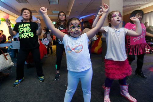 JOHN WOODS / WINNIPEG FREE PRESS
Anya Bojorquez (front) and others Zumba dance at the Family Expo & Kids Fair Sunday, May 21, 2017. The expo is donating part of it's profits to the local chapter of the Canadian Alopecia Areata Foundation (CANAAF)