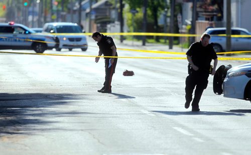 BORIS MINKEVICH / WINNIPEG FREE PRESS
Police have Dominion Street and Ellice Ave. taped off after an overnight assault scene in the West End. May 23, 2017