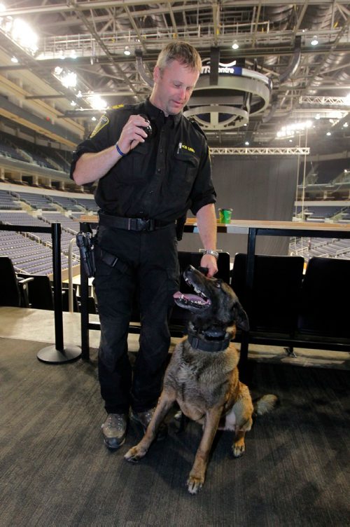 BORIS MINKEVICH / WINNIPEG FREE PRESS
Sargent Dave Bessason with Dante the explosive sniffing dog at MTS Centre. Reaction following the bombing at Manchester Arena in England. There has been a number of media inquiries regarding security measures at the MTS Centre.  The MTS Centre works closely with the Winnipeg Police Service on security at their venue. KEVIN ROLLASON STORY. May 23, 2017