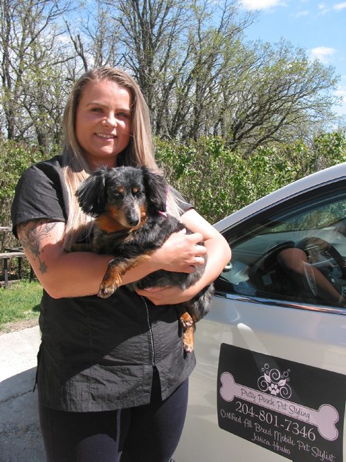 Canstar Community News May 15, 2017 - Jessica Hewko, shown with her dog Bella, runs Pretty Pooch Pet Styling, a mobile pet grooming service from her home in Oak Bluff. (ANDREA GEARY/CANSTAR COMMUNITY NEWS)