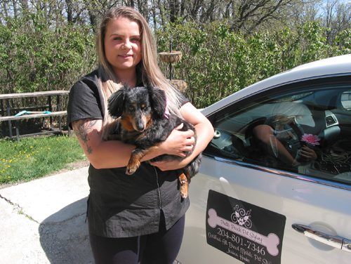 Canstar Community News May 15, 2017 - Jessica Hewko, shwn with her daschund Bella, runs Pretty Pooch Pet Styling, a mobile pet grooming service, from her Oak Bluff home. (ANDREA GEARY/CANSTAR COMMUNITY NEWS)