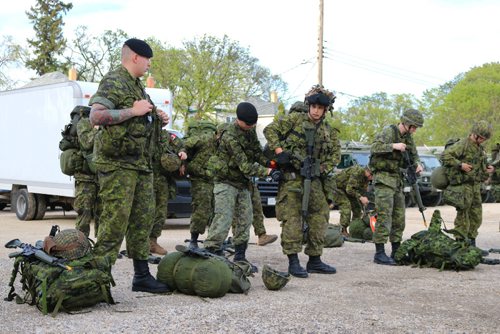 Canstar Community News May 16, 2017 - Members of the Fort Garry Horse prepare to leave McGregor Armoury for the battle fitness training. (LIGIA BRAIDOTTI/CANSTAR COMMUNITY NEWS/TIMES)