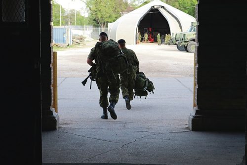 Canstar Community News May 16, 2017 - Members of the Fort Garry Horse leave McGregor Armoury to start the battle fitness training. (LIGIA BRAIDOTTI/CANSTAR COMMUNITY NEWS/TIMES)